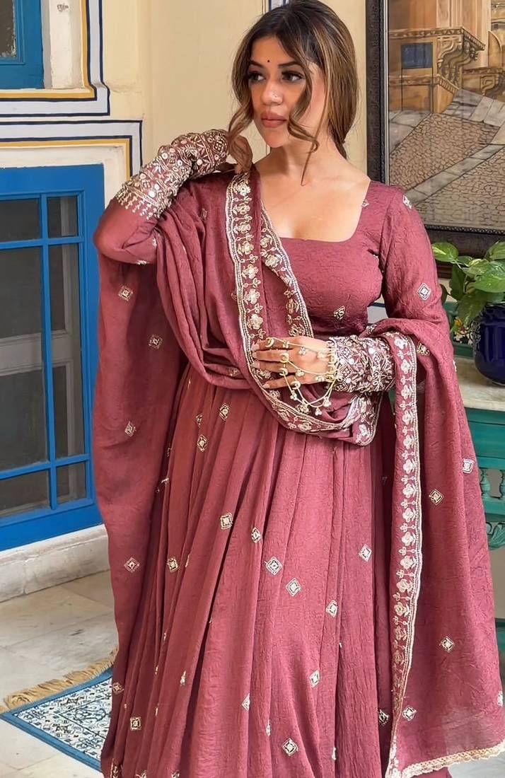 Vibrant light rose sharara suit with mirror work