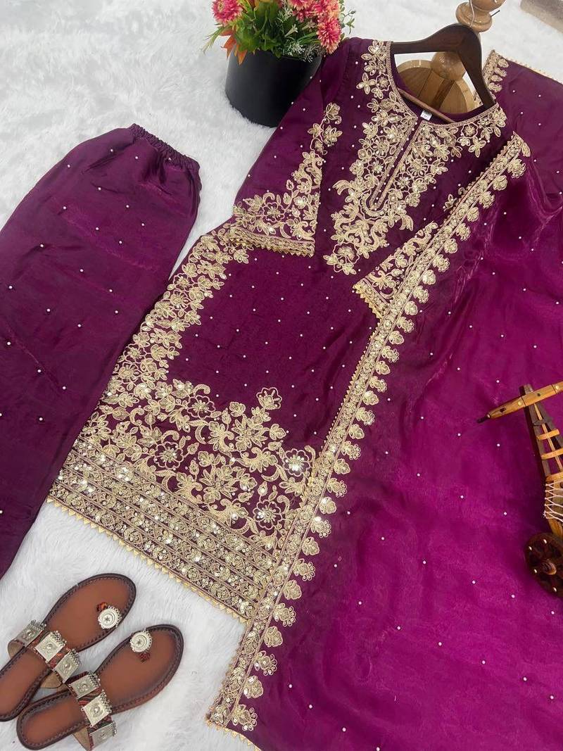 Purple silk palazzo suit with intricate gold border work