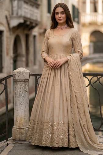 Dark beige gold anarkali gown with heavy sequin hem
