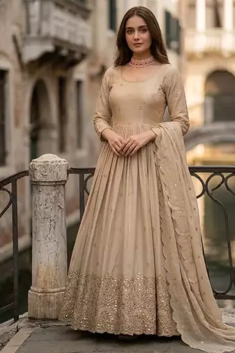Dark beige gold anarkali gown with heavy sequin hem