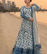 Ethereal blue and white floral print gown with embroidered border
