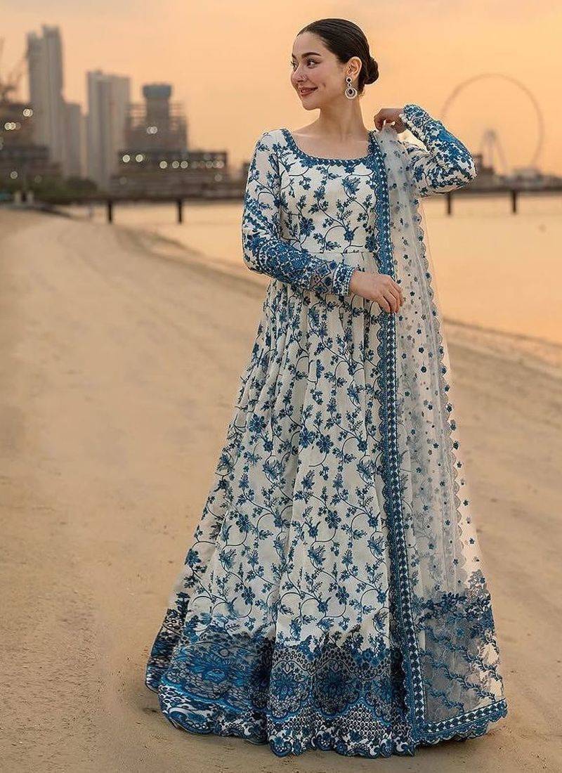 Ethereal blue and white floral print gown with embroidered border