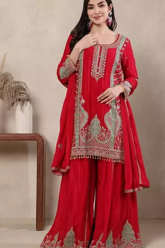 Red embroidered suit with mint green contrasts