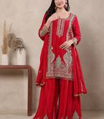 Red embroidered suit with mint green contrasts