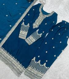 teal blue silk embroidered suit with heavily bordered pants