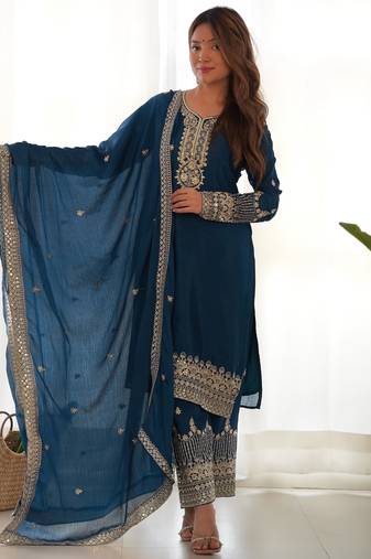 teal blue silk embroidered suit with heavily bordered pants
