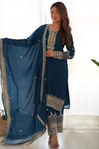teal blue silk embroidered suit with heavily bordered pants