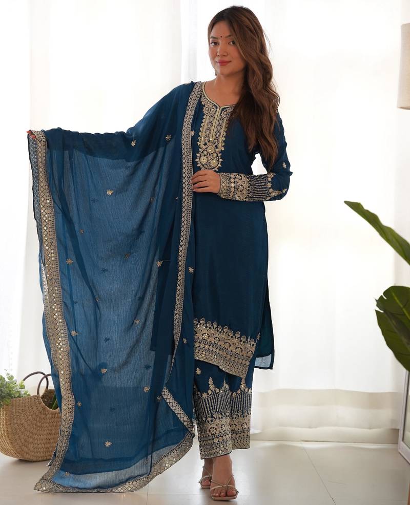 teal blue silk embroidered suit with heavily bordered pants