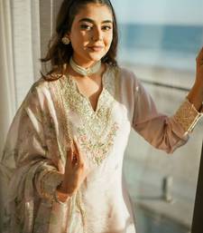 Peach floral embroidered sharara set with organza dupatta