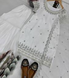 White sharara set with sequin net dupatta