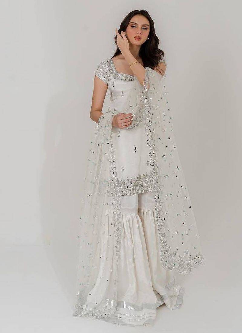 White sharara set with sequin net dupatta