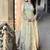 Cream anarkali gown with intricate zari embroidery