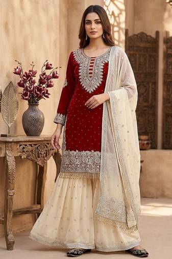 red embroidered sharara suit with cream dupatta