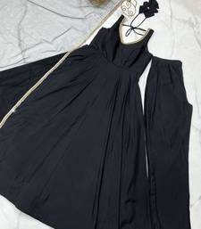 Black sleeveless anarkali with silver border dupatta