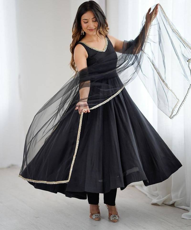 Black sleeveless anarkali with silver border dupatta