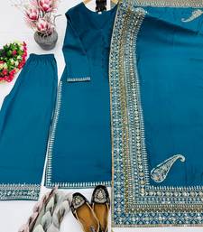Stunning teal blue silk salwar set with intricate ethnic embroidery