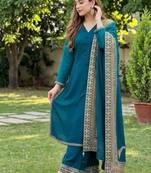 Stunning teal blue silk salwar set with intricate ethnic embroidery