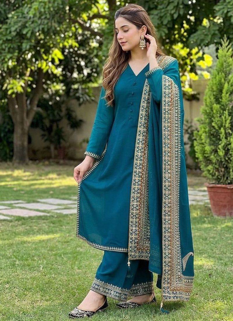 Stunning teal blue silk salwar set with intricate ethnic embroidery