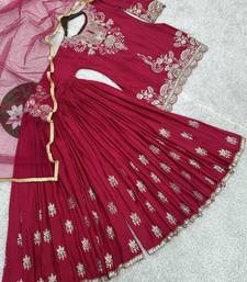 Luxurious magenta silk gharara set with traditional silver zari embroidery