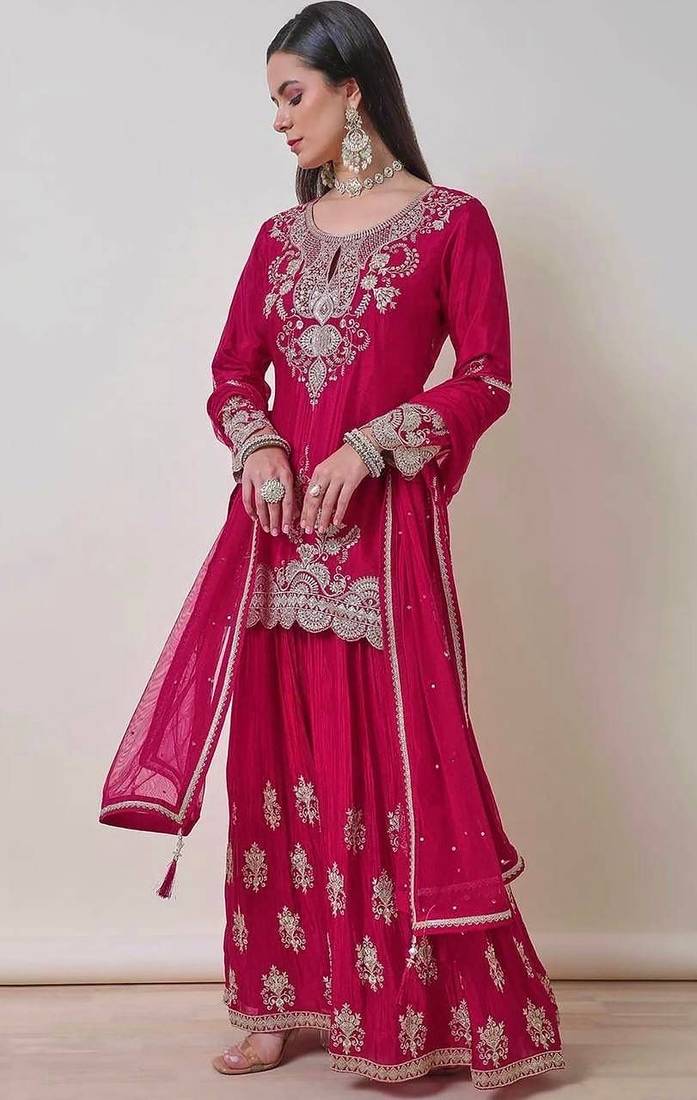 Luxurious magenta silk gharara set with traditional silver zari embroidery