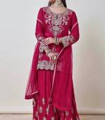 Luxurious magenta silk gharara set with traditional silver zari embroidery