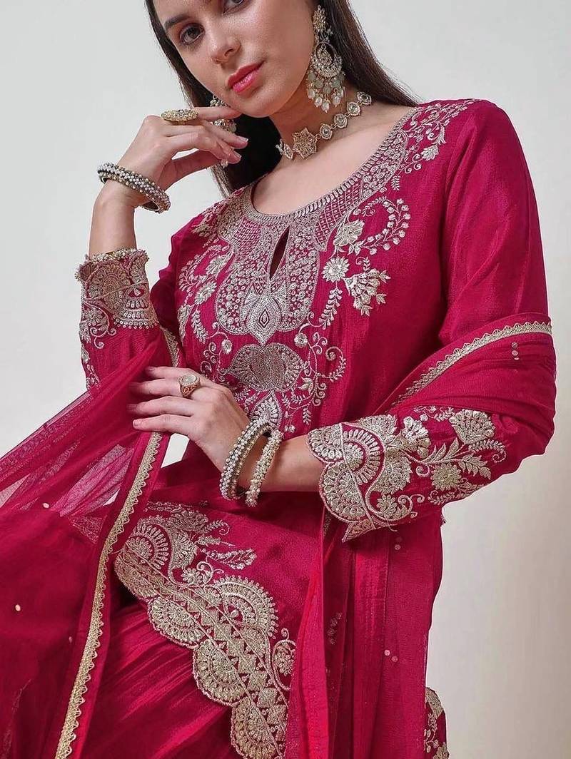 Luxurious magenta silk gharara set with traditional silver zari embroidery