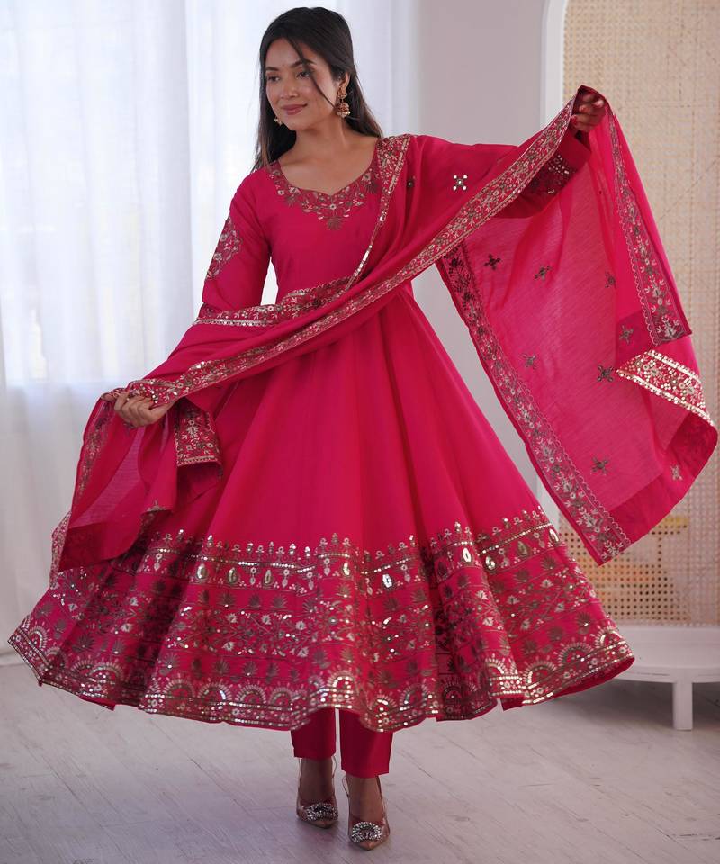 Hot pink flared anarkali suit with silver mirror work border