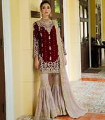 Deep maroon velvet sharara set with heavy gold tilla embroidery