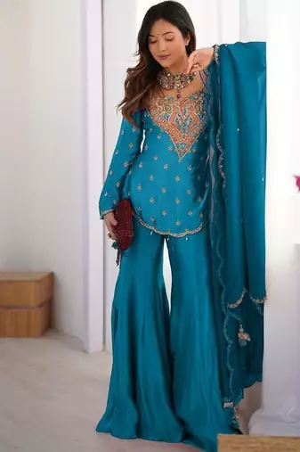 Majestic teal blue silk sharara set with scalloped embroidery details