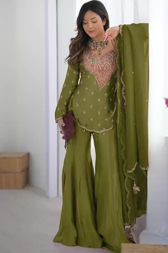 Earthy olive green silk gharara set with traditional zardosi work