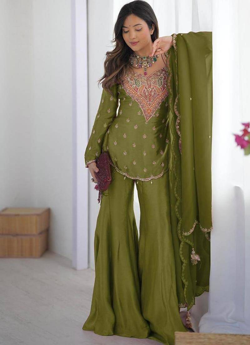 Earthy olive green silk gharara set with traditional zardosi work