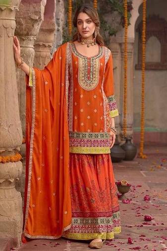 Orange festive kurta and skirt set with dupatta