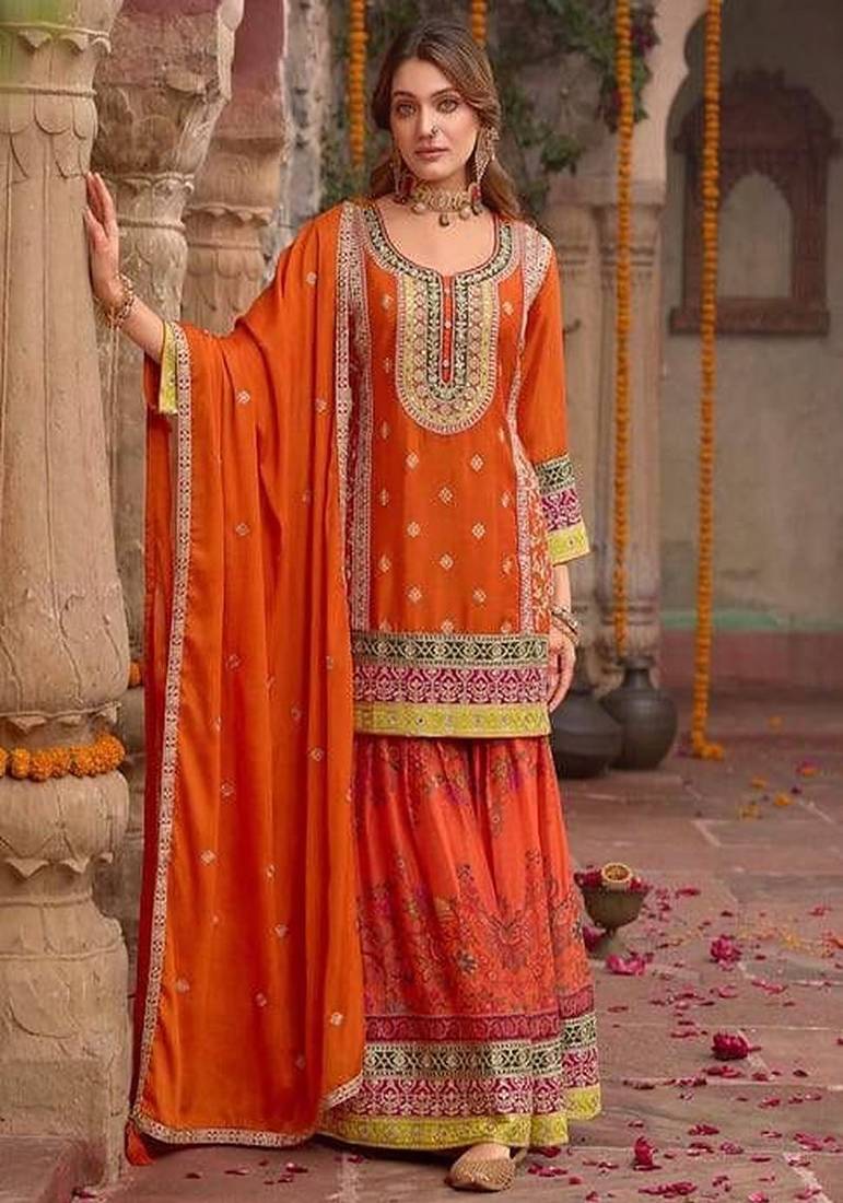 Orange festive kurta and skirt set with dupatta