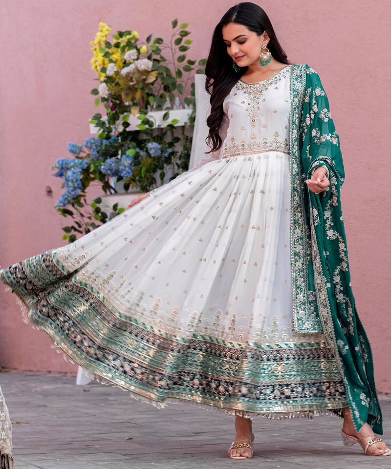 Elegant white anarkali suit with green embroidered dupatta