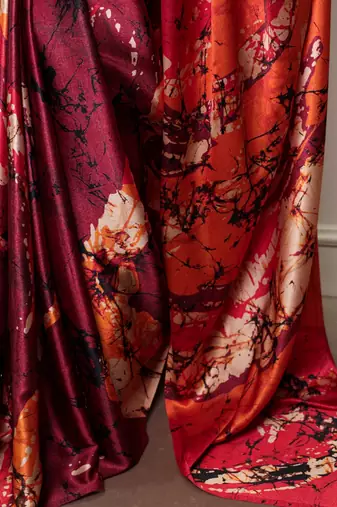 Maroon satin silk printed saree with a natural silk unstitched blouse
