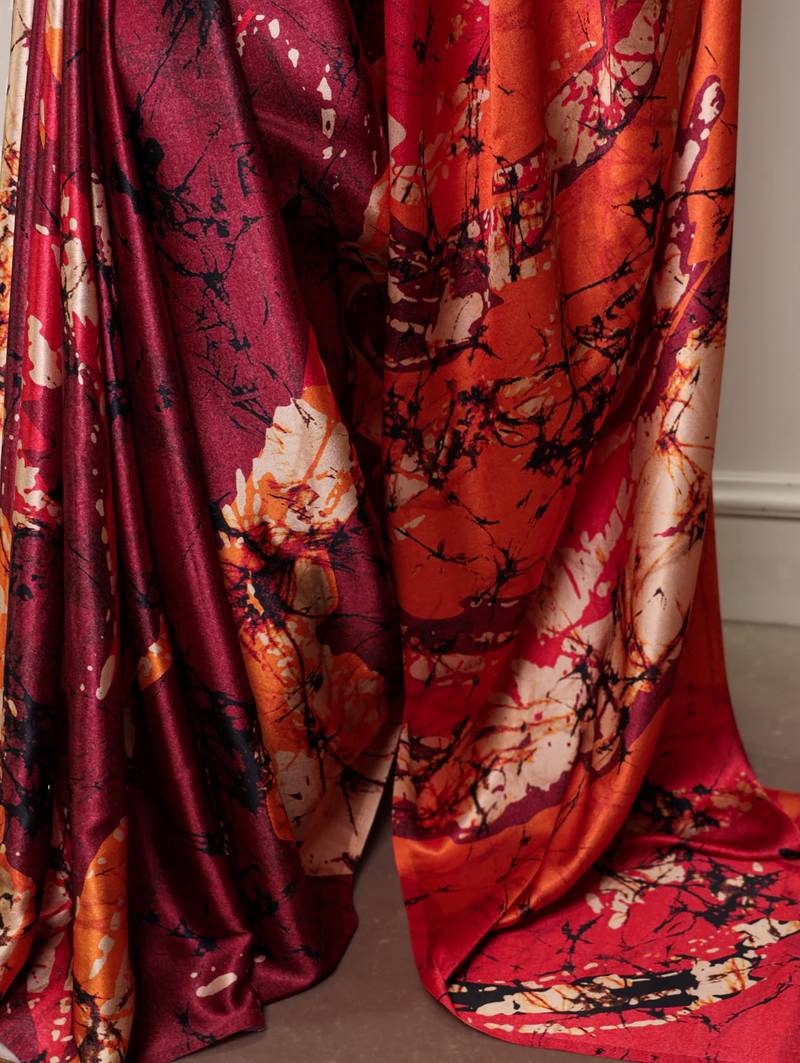 Maroon satin silk printed saree with a natural silk unstitched blouse