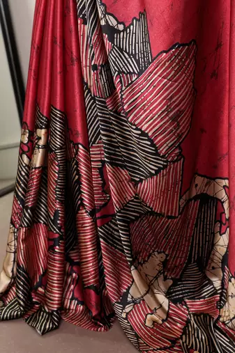Red satin silk printed saree with a natural silk unstitched blouse