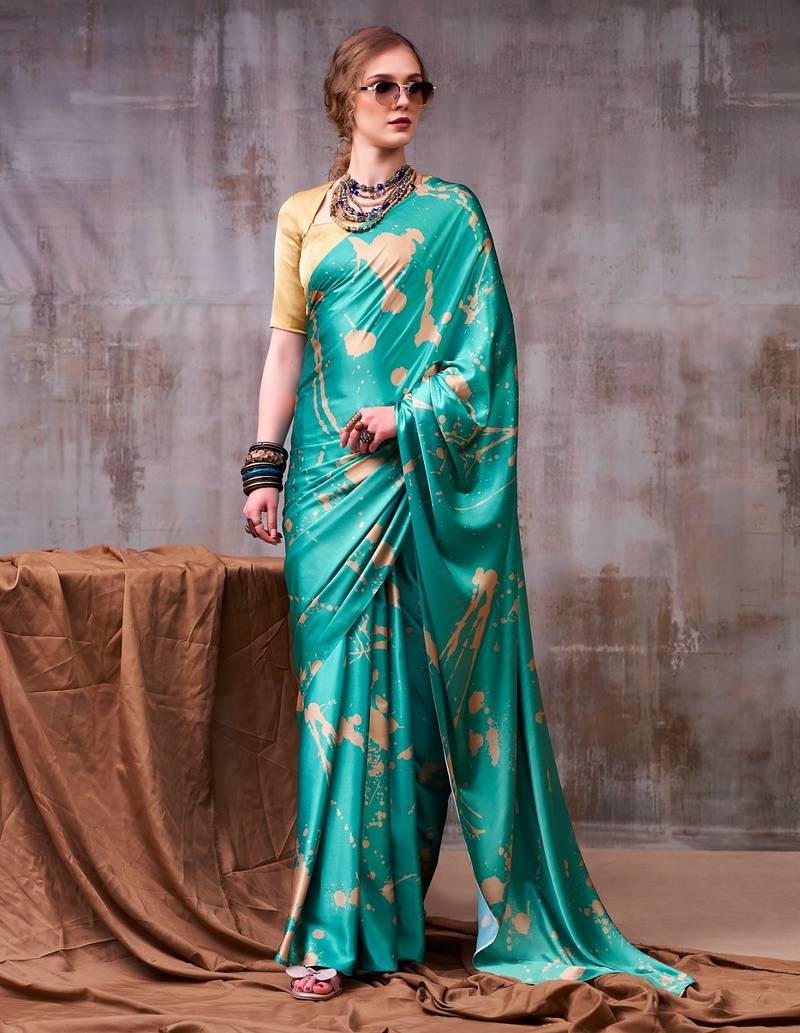 Sea blue satin silk printed saree with a natural silk unstitched blouse