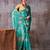 Sea blue satin silk printed saree with a natural silk unstitched blouse