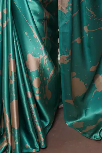Sea blue satin silk printed saree with a natural silk unstitched blouse