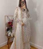 Ethereal white georgette suit with intricate silver pearl embroidery