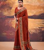 Orange crepe printed saree with unstitched blouse