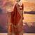 Orange crepe printed saree with unstitched blouse