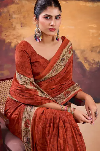 Orange crepe printed saree with unstitched blouse