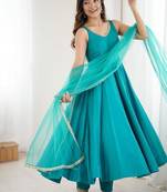 Teal blue sleeveless anarkali suit with mirror work neckline