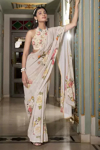 Off white spectacular georgette printed with pearl lace saree with unstitched blouse