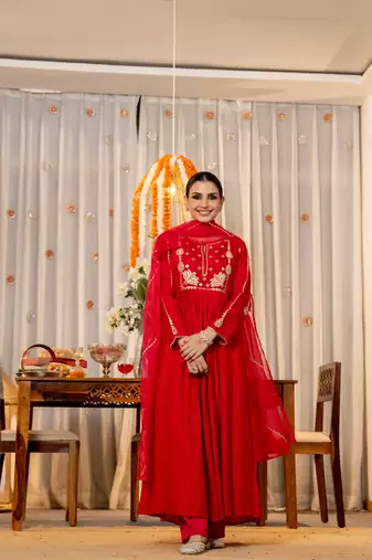  red embroidered chanderi silk blend anarkali kurta set with dupatta & pant for women