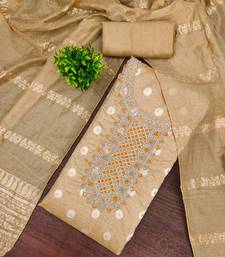 Embroidered unstitched salwar suit with woven dupatta