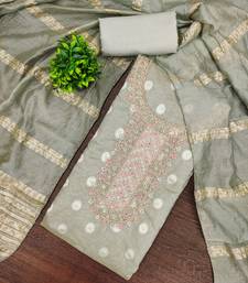 Embroidered unstitched salwar suit with woven dupatta