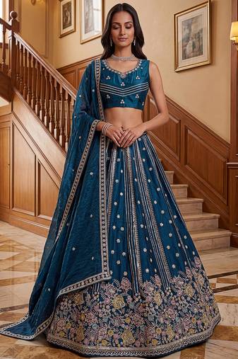 Dazzling Teal Blue Sequins Oragnza Marriage Wear Lehenga With Blouse